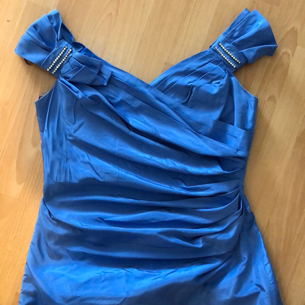 Off shoulder with a train gown Teri Jon